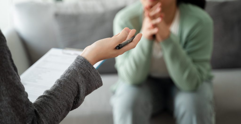 Psychologist doctor examine and listen and talking to patient with depression, anxiety, therapy session, mental health concept